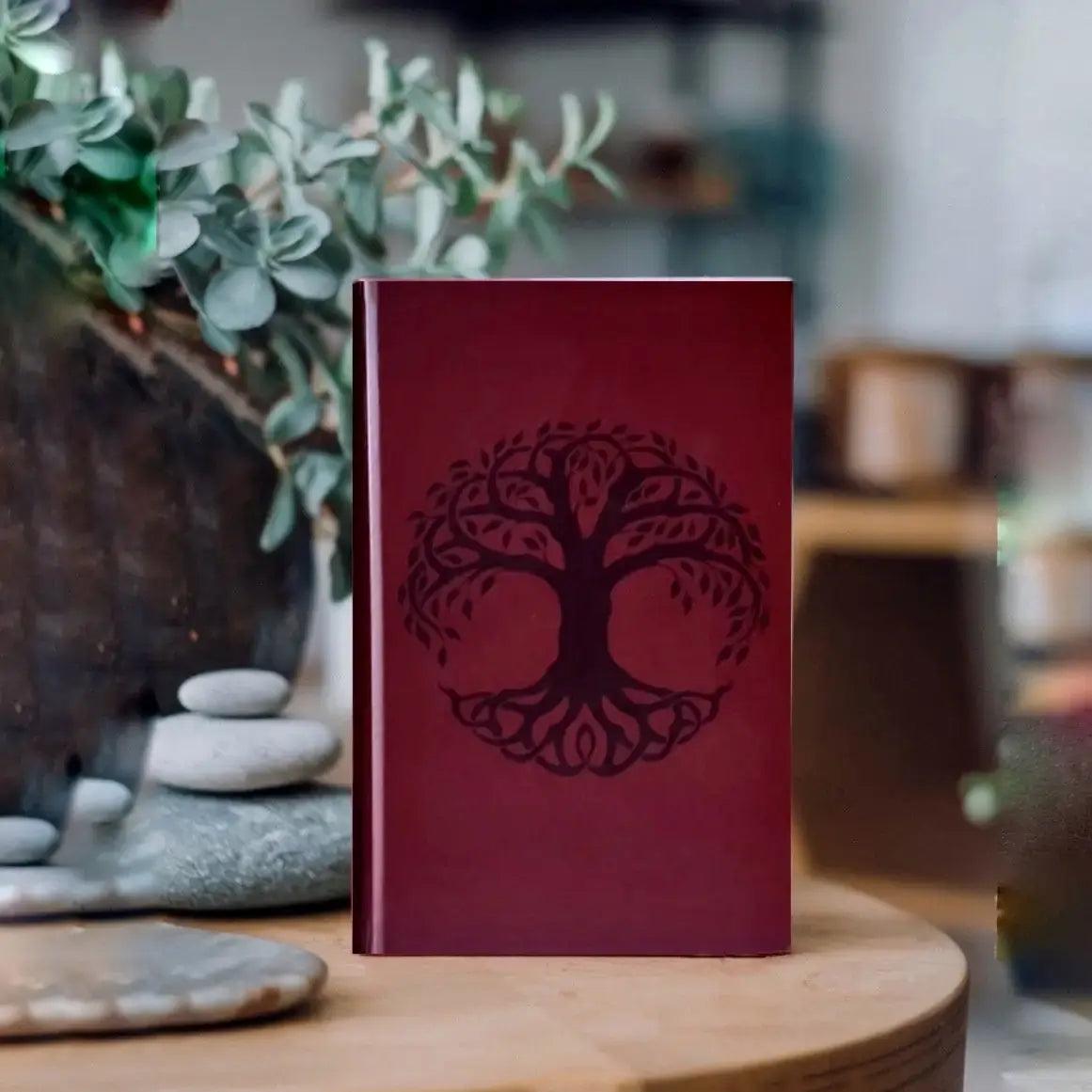 12-weeks planner burgundy dark planner situated on a table code of she